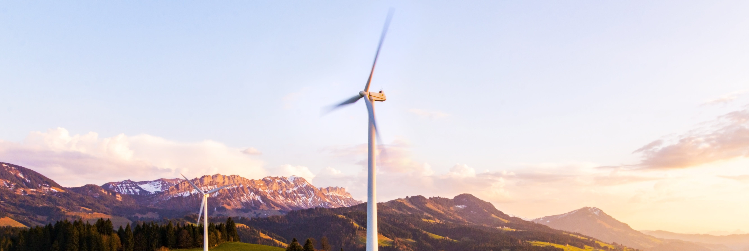 Wind turbine in the mountains during the sunrise, 1