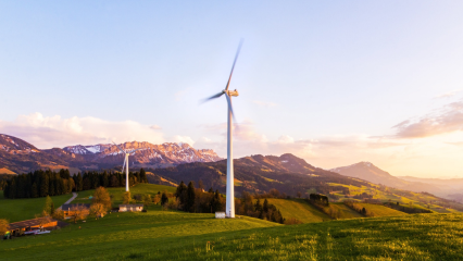 Wind turbine in the mountains during the sunrise, 2