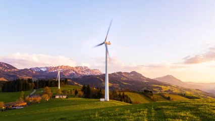 Wind turbine in the mountains during the sunrise, 2